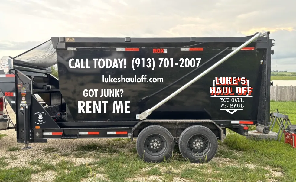 Luke's Haul Off black dump trailer reading Got Junk? Rent Me